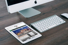 Load image into Gallery viewer, Free Man or Woman Holding a Set of iPad PSD Mockups
