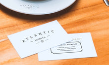 Load image into Gallery viewer, Free Business Cards and Coffee Cup on Table (Mockup)
